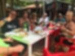 People enjoying food after Mahi Mahi Fishing Tours