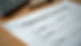 Eye-level view of a printed Cognitive Flexibility Inventory questionnaire on a wooden table