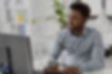 Black man at computer - shutterstock_1132147121_edited.jpg