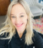 Man massaging a pregnant woman's shoulders