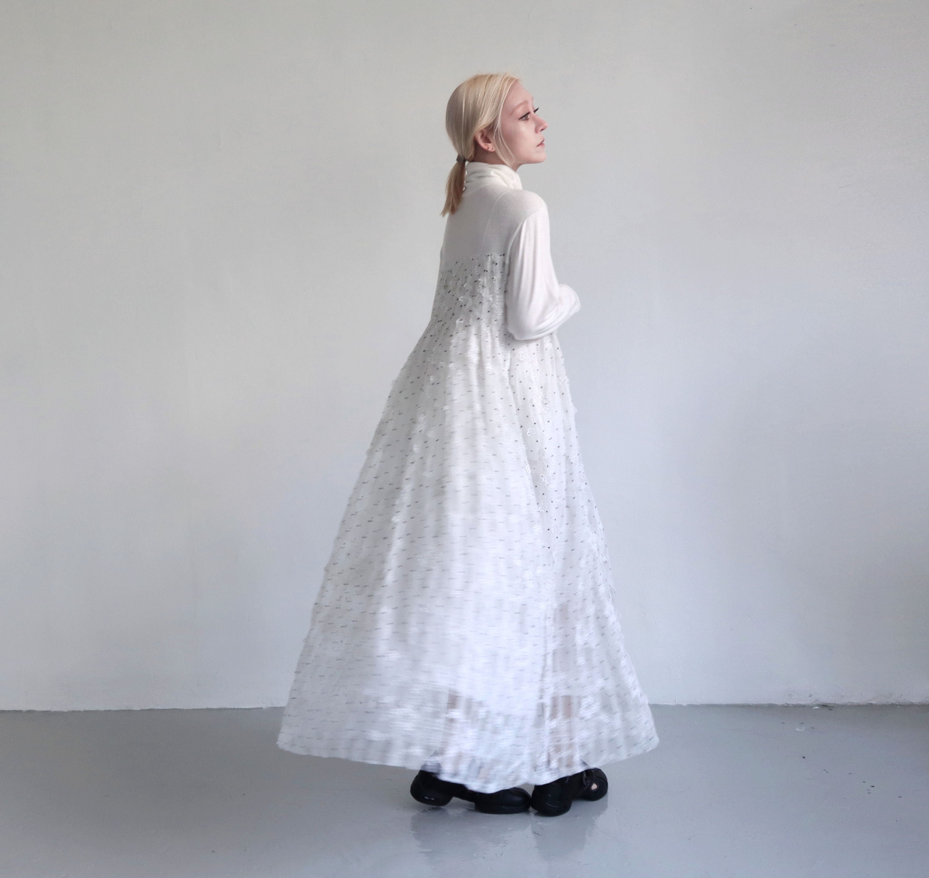 Softened Time Beneath the Pleats