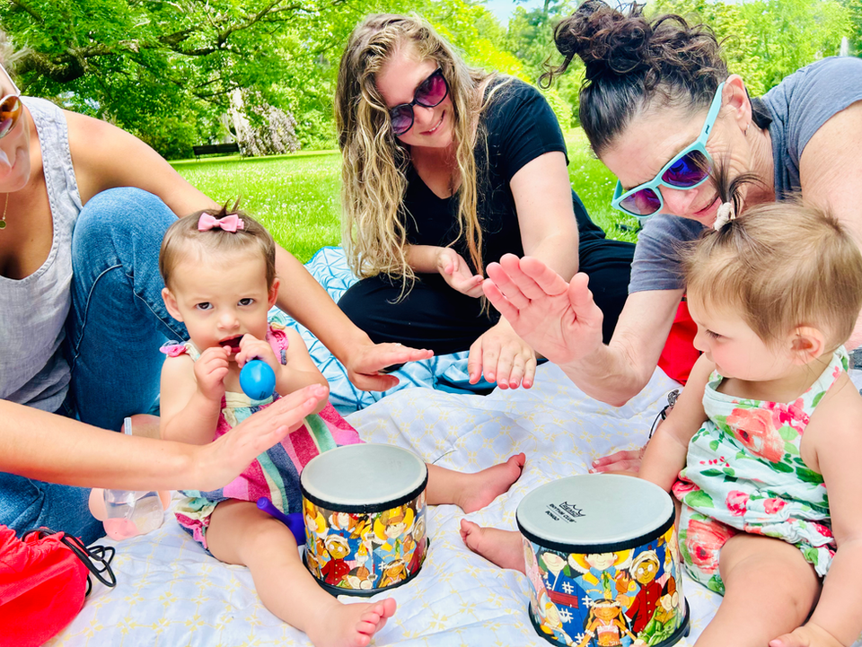 West End Boston music class where adults play drums with kids