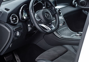 the interior of a car with the door open_edited.jpg
