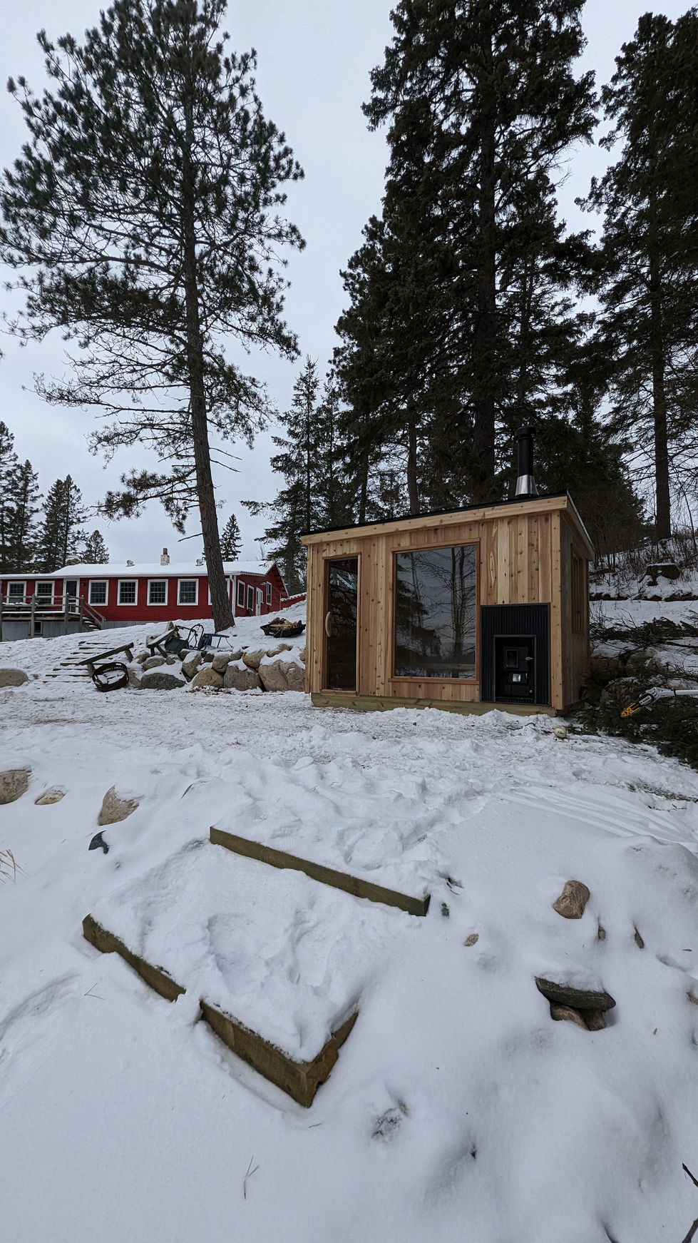 Lake front sauna, exterior loading sauna stove, cabin sauna, sauna window, 8 person sauna |Sota Sauna Co.