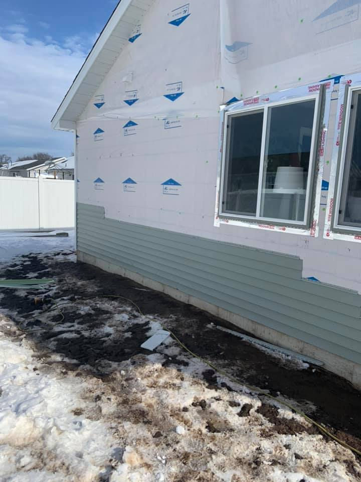 Partial siding replacement on a house exterior