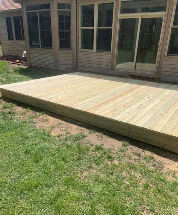 Completed deck remodeling project by Precision Roofing And Remodeling