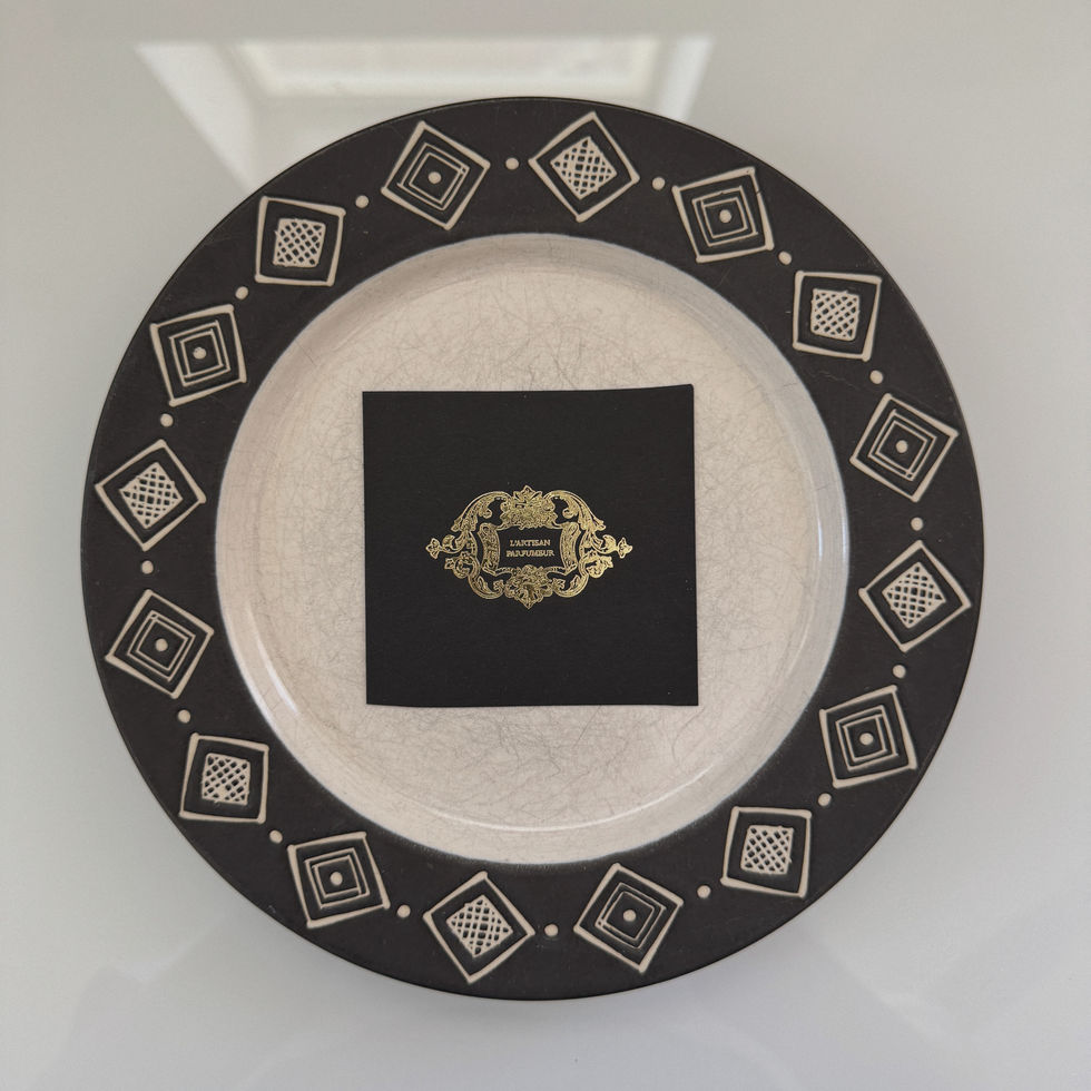 Business card from L'Artisan Parfumeur