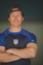 Man in USA athletic shirt for a dating profile photographer.