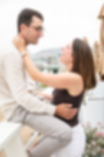 Couple sharing an intimate moment with a couples photographer.