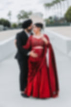 Couple in formal attire by a couples photographer