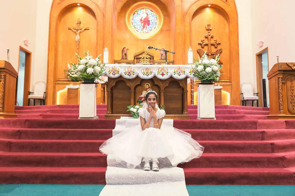 Young girl at her First Communion by an event photographer.