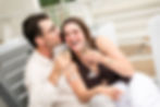 Couple toast with champagne by a couples photographer.