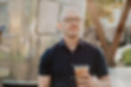 Man with iced coffee by dating profile photographer