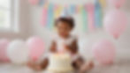 Toddler celebrating with cake by a birthday party photographer