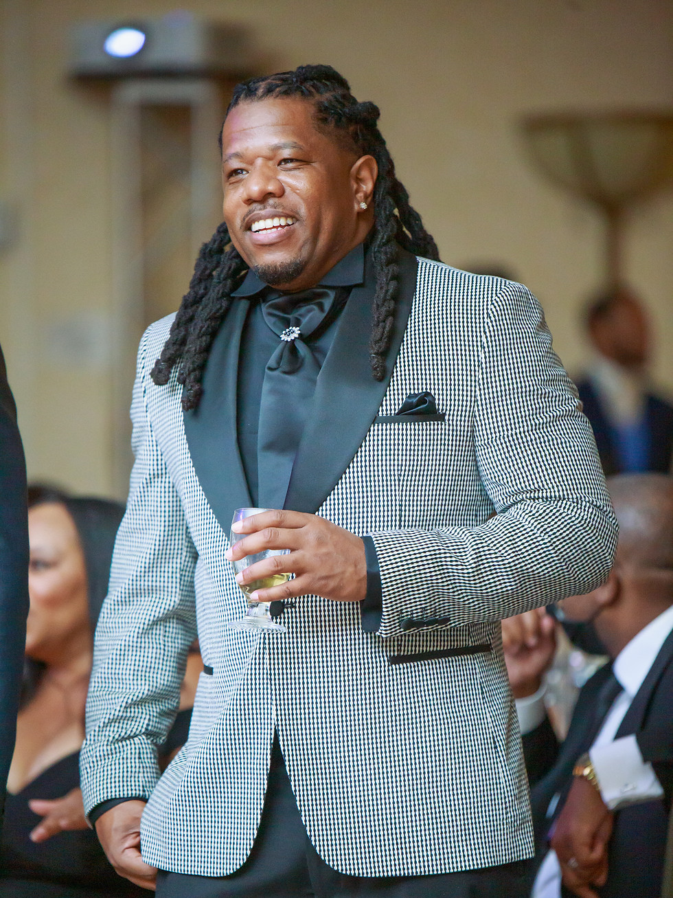 Smiling man at Events captured by event photographer.