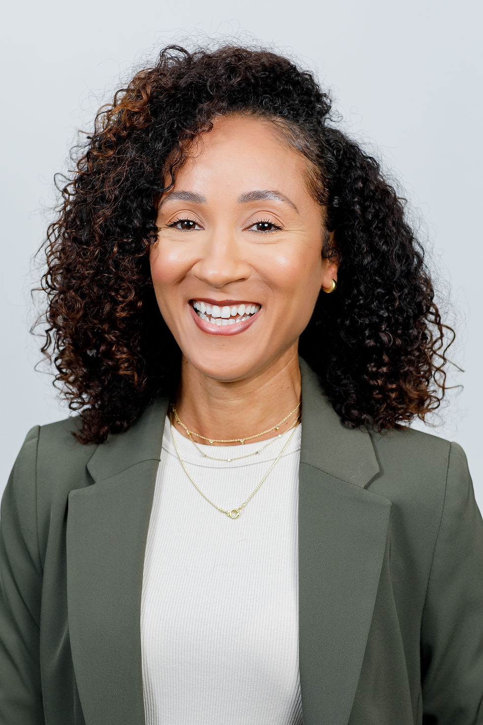 Professional realtor headshots orange county of a smiling woman.