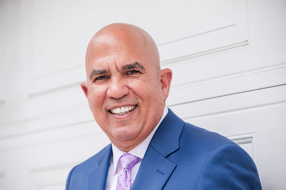 Smiling man’s realtor headshot in Orange County.