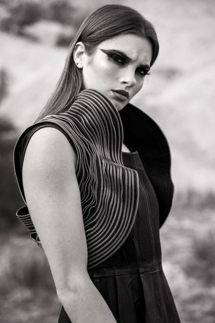 Nikki Lund lookbook fashion campaign photography featuring model in structured black dress at Vasquez Rocks — Dynasty Fashion