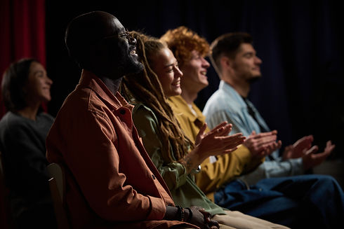 group-of-diverse-young-adults-applauding-at-event-2026-03-24-03-32-40-utc.jpg