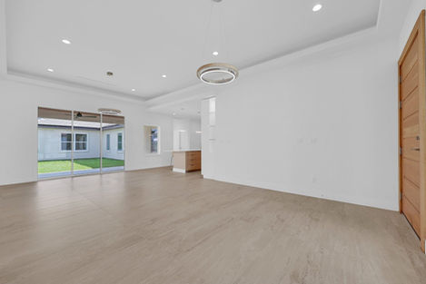 4817-sweetwater-dr-open-living-area-backyard-view-kitchen