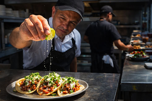 Chef-Sprinkles-Lime-Onto-Tacos.jpg