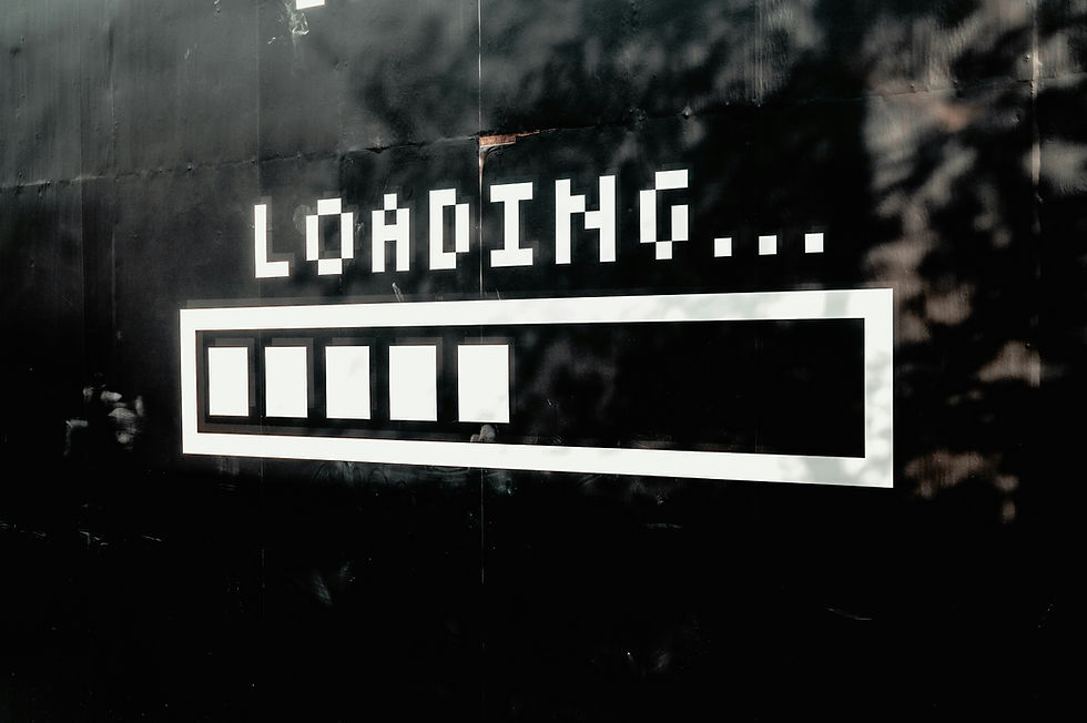 Bold white "LOADING..." text and progress bar on a dark, shadowy background. Five empty squares in the bar suggest waiting or delay.