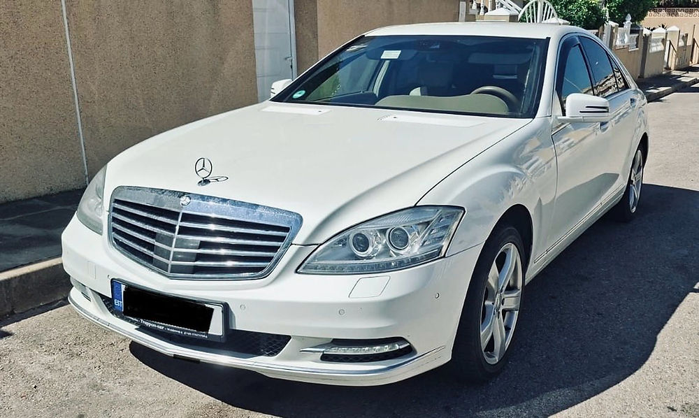 White Mercedes-Benz sedan