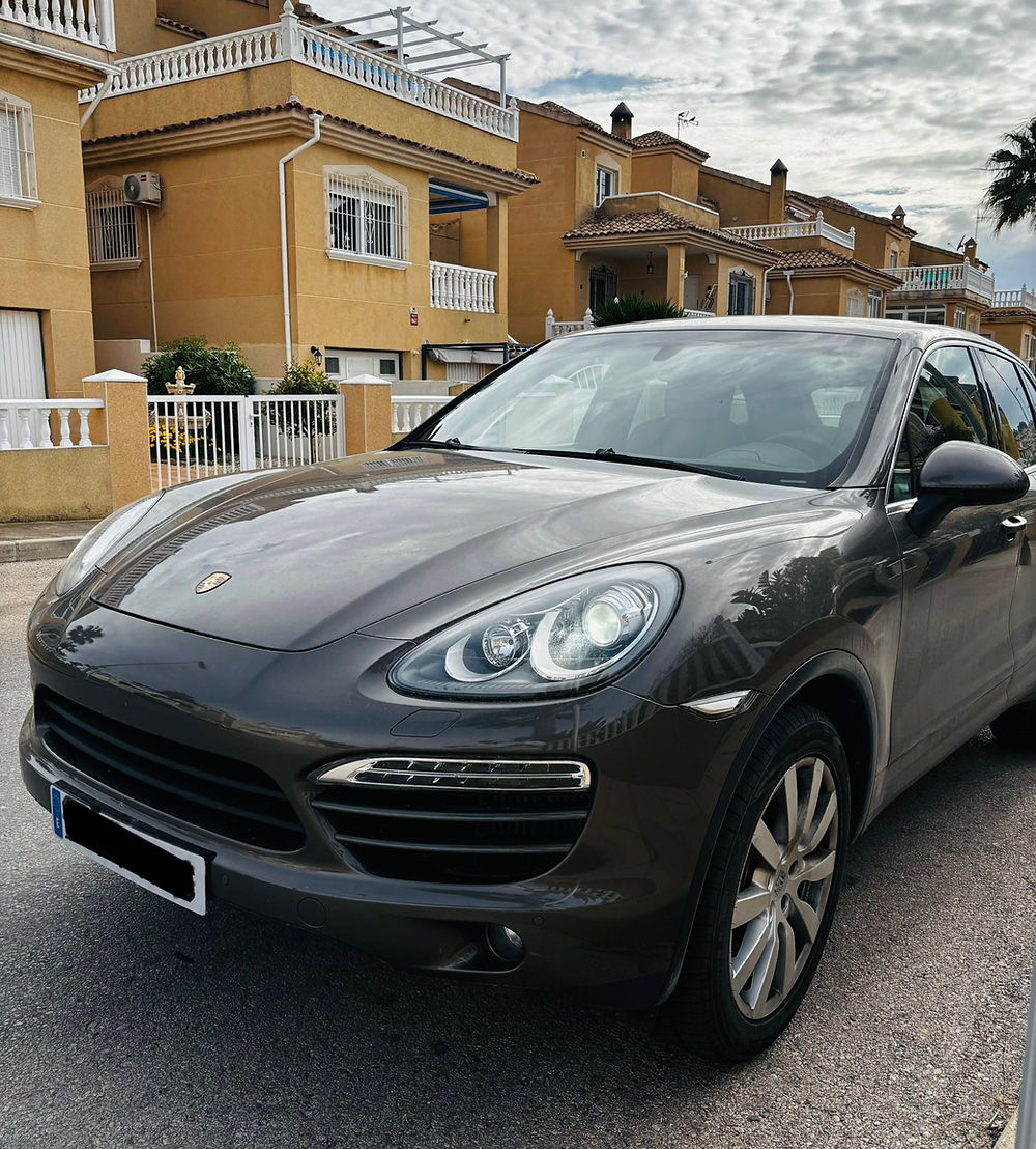 Dark grey Porsche Cayenne SUV