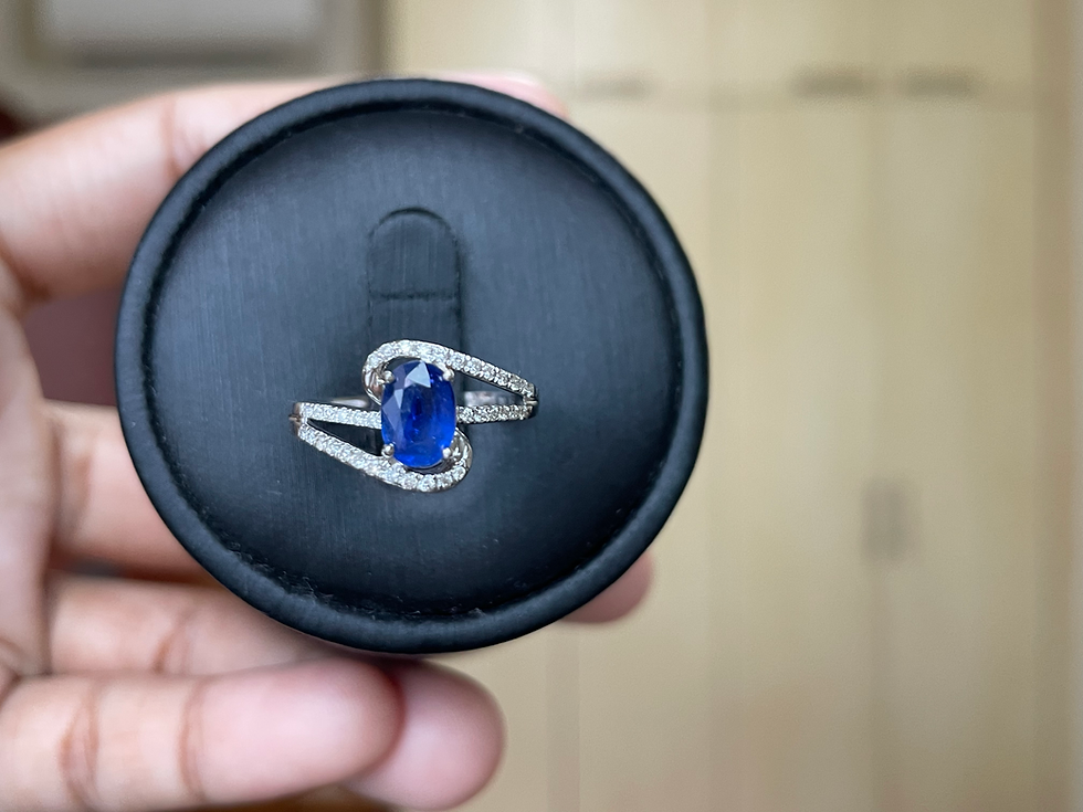Thumbnail: 1Ct Beautiful Oval blue sapphire with a Twist Shank Ring
