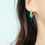 Thumbnail: SGA Natural Colombian Emerald Lever Back Earrings in 18k gold