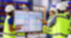 Warehouse workers looking at ERP Data.
