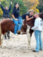 Girls on horse during summer horse camp at Heritage Ranch