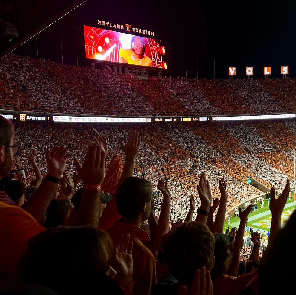 Volunteers cheering on the University of Tennessee football team