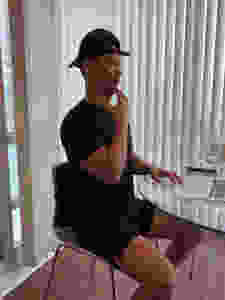 Sitting up right, slide your head back to stretch your neck