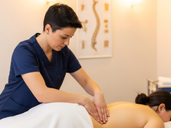 Medical massage therapist providing targeted back pain treatment in westminster, co