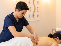Medical massage therapist providing targeted back pain treatment in westminster, co