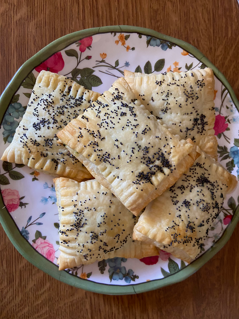 Rettangoli di sfoglia con spinaci, robiola e noci