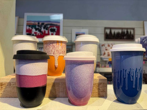 Ceramic travel mugs with silicone lids, just beautiful! A best seller here.