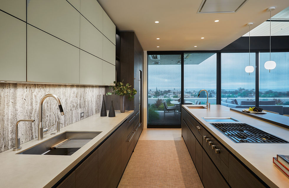 Contemporary open floor plan kitchen with natural wood elements and minimalist finishes