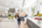 The team showcasing their workspace in a European Kitchen Showroom.