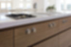 Sophisticated frosty white kitchen with seamless cabinetry, integrated appliances, and stylish details for a modern look
