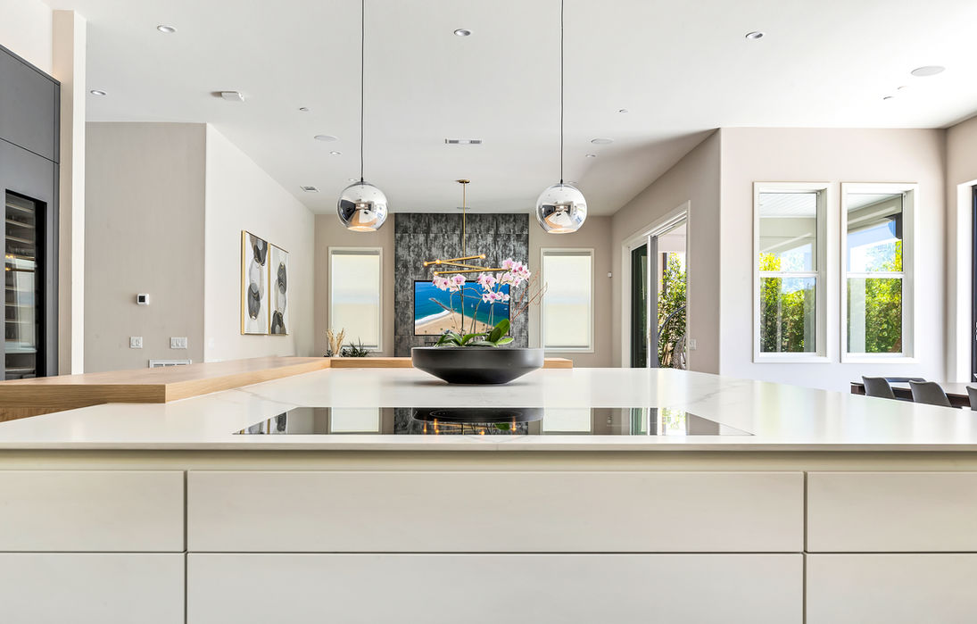 High-end contemporary luxury modern kitchen design with custom cabinetry, elegant lighting, and a perfect blend of functionality and style



