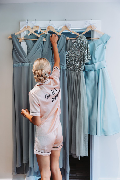 Bridesmaid hanging dresses at Isle of Wight Wedding