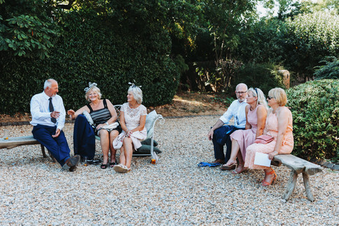 wedding guests enjoying the shade at east afton farmhouse Isle of Wight