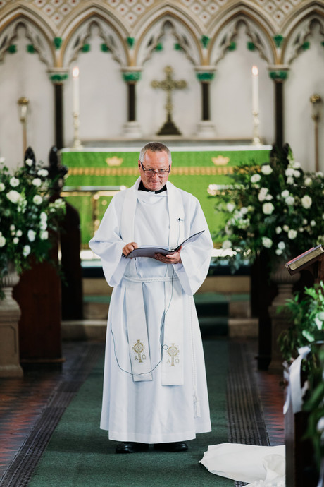 vicar during london church wedding