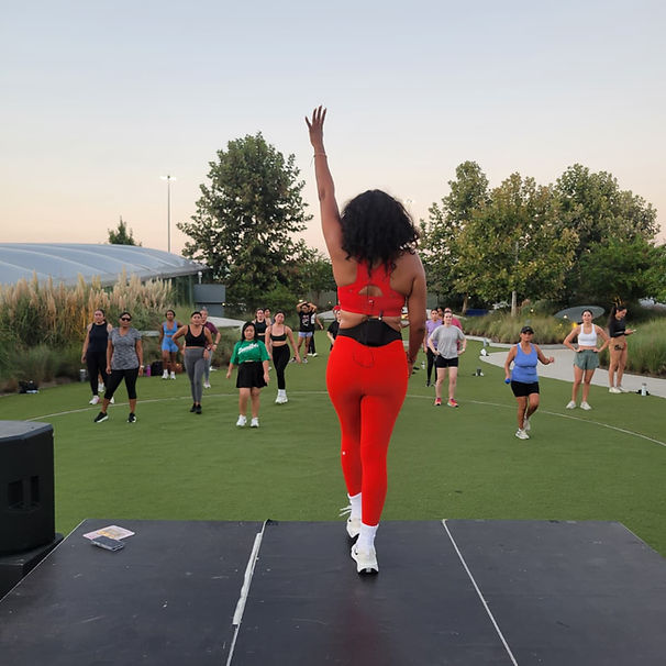 A joyful community Zumba class filled with music, movement, and connection