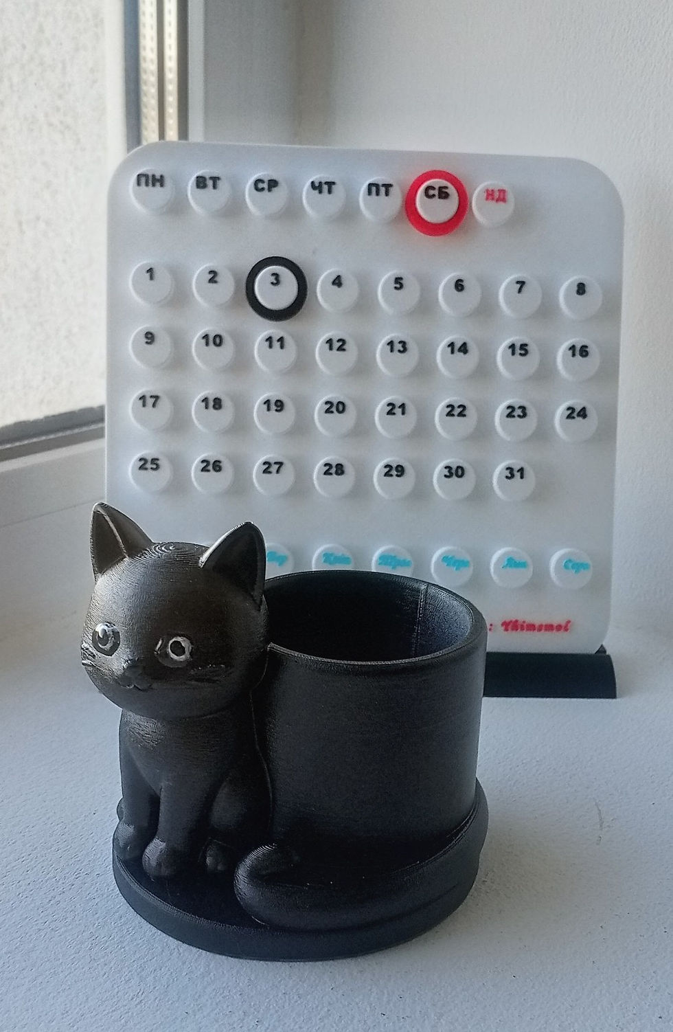 Котик-тримач для ручок