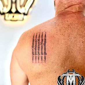 Thai Sak Yant style tattoo on back by Tattoo Mood Studio Pattaya in Pattaya Thailand