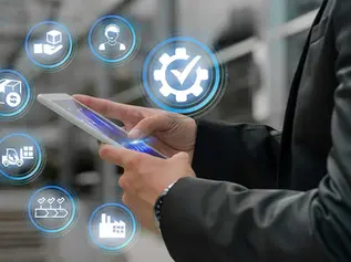 Hands holding a smartphone with digital logistics icons floating above. Background is blurred. Blue highlights create a techy mood.