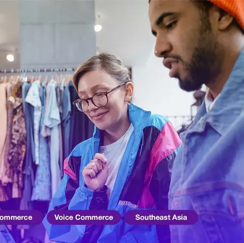 Two people in a clothing store use a tablet. Background features racks of clothes. Text: Retail, E-Commerce, Voice Commerce, Southeast Asia.